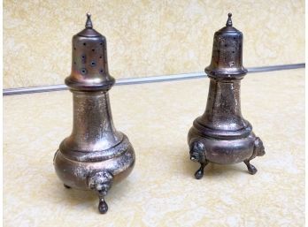 A Pair Of Sterling Silver Salt And Pepper Shakers