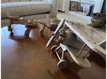 Three Wooden Planes From A Large Mobile