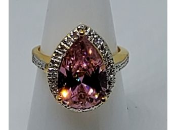 9.44CT Pear Shaped Created Imperial Pink Topaz & 0.12CTW Diamond Accent Sterling Silver Ring