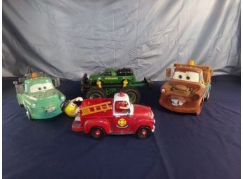 Mixed Lot Of 4 Character Toy Trucks