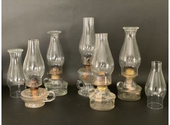 A Collection Of Antique Oil Lamps