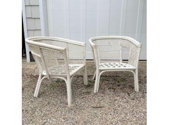 A Pair Of Rattan Chairs