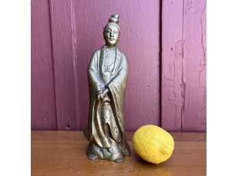 A Brass Standing Buddha Figurine