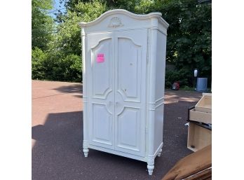 A White Armoire With 3 Drawers And 3 Shelves