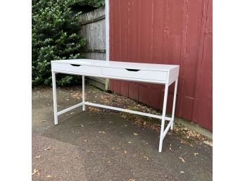 A Clean White Steamlined 2 Drawer Desk On Metal Base