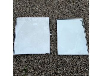 A Pair Of Metal Framed Mirrors
