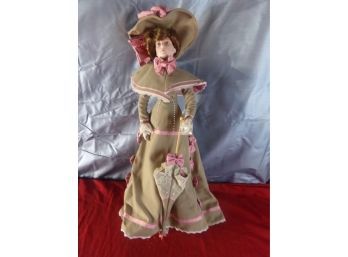 Porcelain Doll With Tan And Pink Dress Holding An Umbrella (#16)