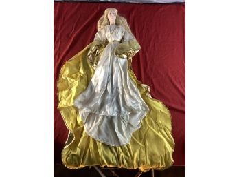 Porcelain Doll In White Dress With Gold And Yellow Cape