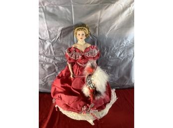Porcelain Doll In Red Dress With Masquerade Mask