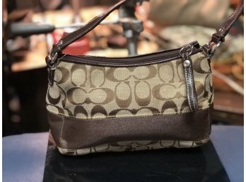 Coach Brown Small Clutch Handbag In Signature Jacquard Style