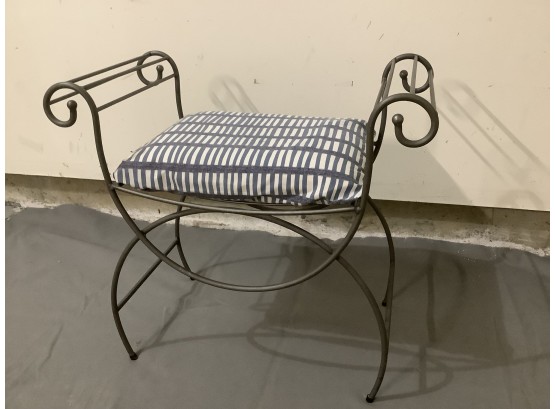 Black Iron Bench With Blue And White Cushion