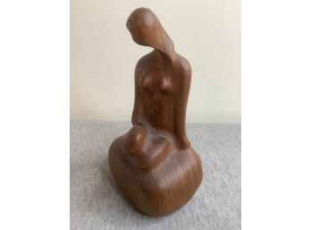 Wooden Sculpture Of A Women
