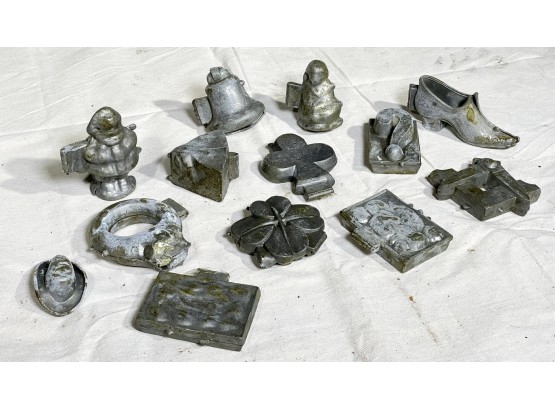 A Collection Of Antique Pewter Chocolate Molds