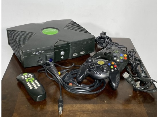 An Xbox And Assorted Accessories