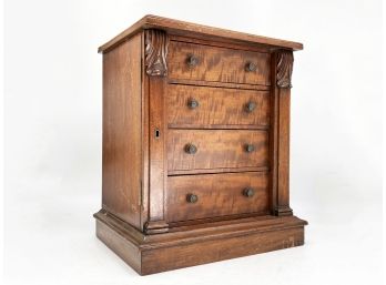 An Antique Mahogany Jewelry Box With Side Panel Lock