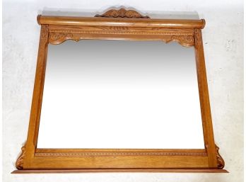 A Large, Victorian Style Beveled Oak Mirror