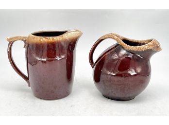 A Pairing Of Vintage Hull Pottery Brown Drip Pitchers