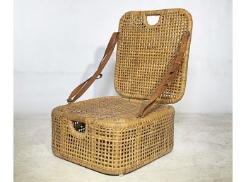 An Antique Wicker Hamper And Seat