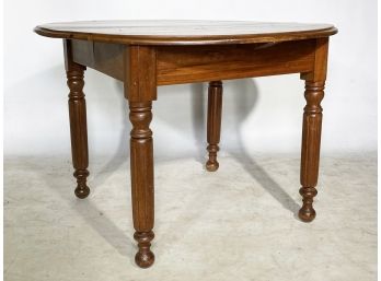 An Antique Maple Turned Leg Dining Table