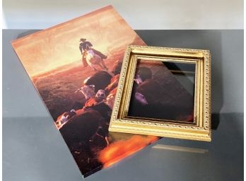 A Western Themed Canvas Print And Gilt Wood Photo Frame