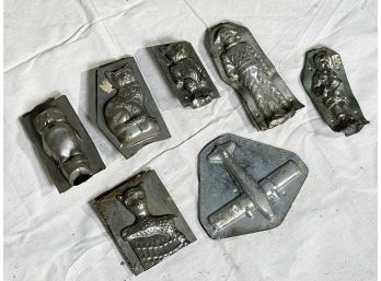 A Group Of Antique Factory Chocolate Molds - Animal, Airplane, Musician, Pierrot