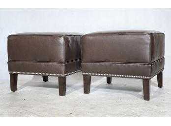 A Pair Of Modern Chestnut Leather Ottomans With Nailhead Trim By Ethan Allen