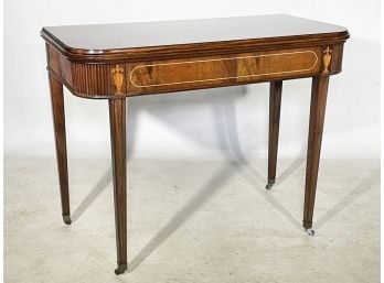 An Antique Flip Top Console/Extendable Dining Table