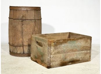 A Rustic Barrel And Wood Crate