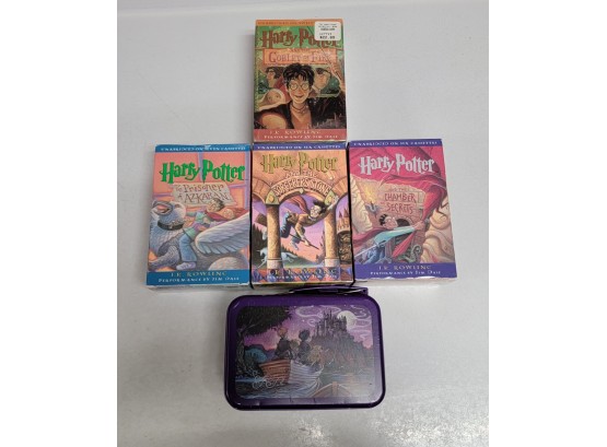 Collection Of Harry Potter Casettes And Small Lunchbox