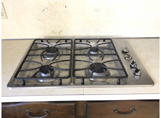 A Stainless Steal Gas Cooktop -Worn, Needs New Knobs