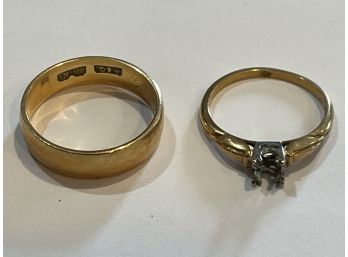 A 14K GOLD WEDDING BAND AND A 14K GOLD ENGAGEMENT RING SETTING