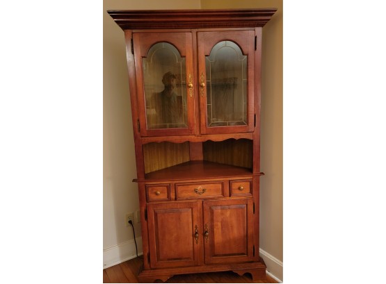 Corner Hutch.  Illuminated And Ready To Display Your Cherished Pieces