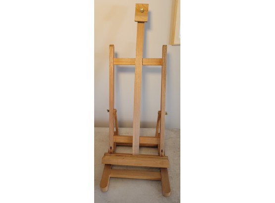Easel Wood And Adjustable.  No Paint On It.