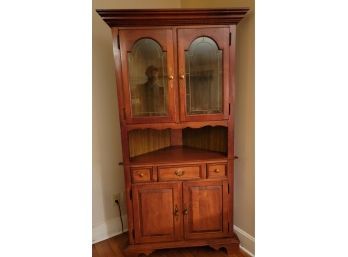 Corner Hutch.  Illuminated And Ready To Display Your Cherished Pieces