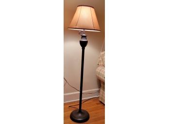 Lamp # 3 .  Floor Lamp With A Copper Glow To The Shade.