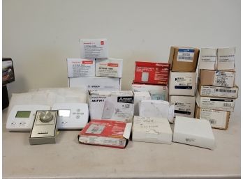 Assorted Thermostats And More