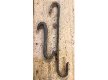 TWO EARLY WROUGHT IRON 'S' HOOKS