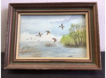 Signed Art Of Geese Flying Over The Water