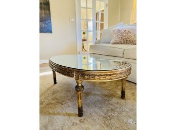 Antique French Oval Mirrored Top Coffee Table In Carved Gilt