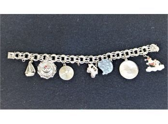 Sterling Silver Charm Bracelet With Seven Charms Including- Happy Birthday- Santa- Vegas-hawaii & More