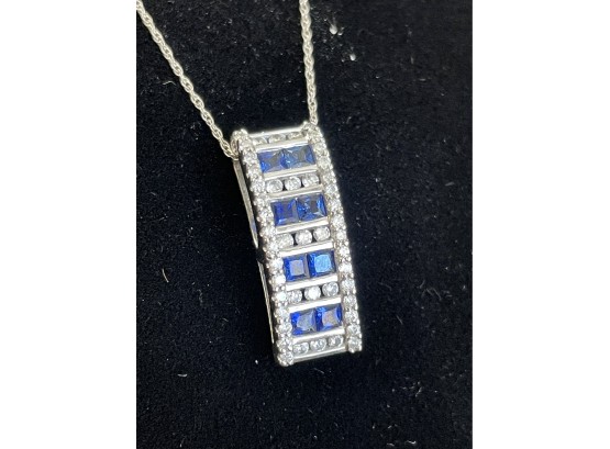 14 K White Gold Diamonds And Blue Stone Pendant - Necklace .