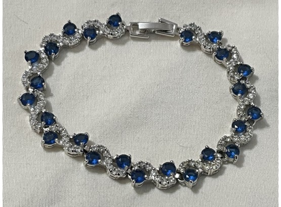Sterling (Marked 925) Bracelet With Clear Rhinestones And Blue Stones