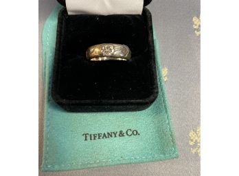 Tiffany &Co. Sterling Silver Womans Ring With Floral Design . Signed Tifffany&co. 925 Copyright .