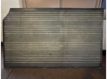 A Vintage Chalkboard With Musical Staffs