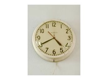 A Vintage General Electric Wall Mounted Clock