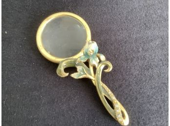Early Heavy Floral Magnified Glass