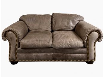 Mocha Leather Roll Arm Loveseat With Brass Nailhead Detail