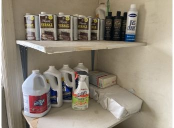 Assorted Commercial Cleaning Products And Towels