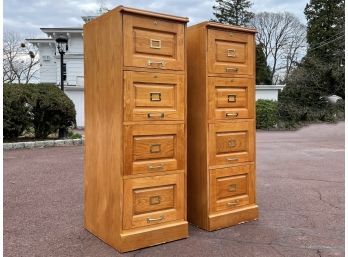 A Pair Of Vintage Paneled Oak File Cabinets