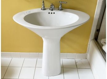 A Modern Pedestal Sink And Chrome Taps By Kohler - 118